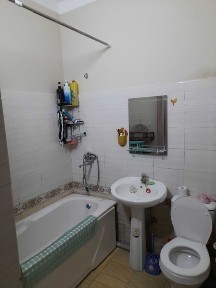 Ko'p qavatli uydagi xonadon