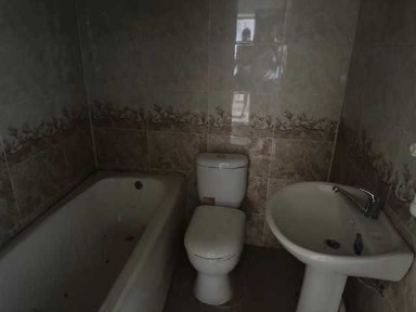 Ko'p qavatli uydagi xonadon