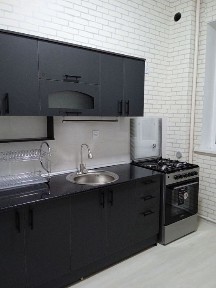 Санат-саройи олдида Янги курилган Дом.