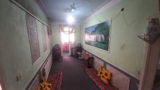 Ko'p qavatli uydagi xonadon