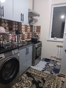 Angor tumani sharq guli mahallasida joylashgan kup qavatli uylar