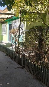 Продается коттедж угловой за ЦУМОМ. Коттедж сотилади