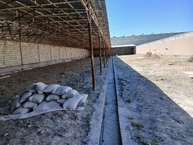 Sotilad:Navbaxor postidan oʻtkanda moy zavodni orqa tomonida Omborxona
