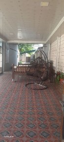 Продаётся 2 этажный коттедж в посёлке Эйвалик Ахангаранском районе