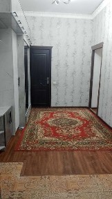 Ko'p qavatli uydagi xonadon