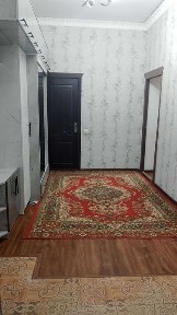 Ko'p qavatli uydagi xonadon