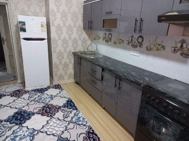 Soat oldida nasimiy tepasi