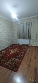 Мегапланетом, примерно в 10 минутах ходьбы от метро «Шахристан».