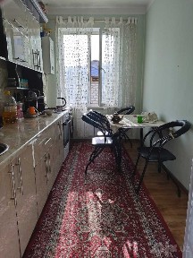 Ko'p qavatli uydagi xonadon (18-uy 4-xonadon)